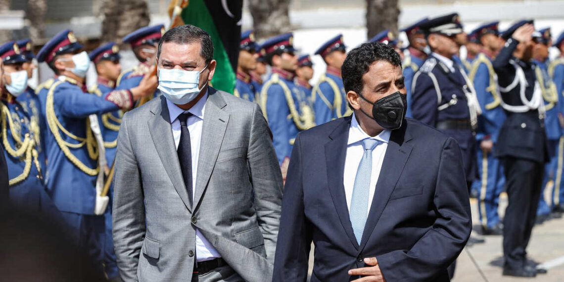 رئيس الحكومة الليبية، عبدالحميد الدبيبة، ورئيس المجلس الرئاسي الليبي، محمد المنفي.صورة.فرانس 24