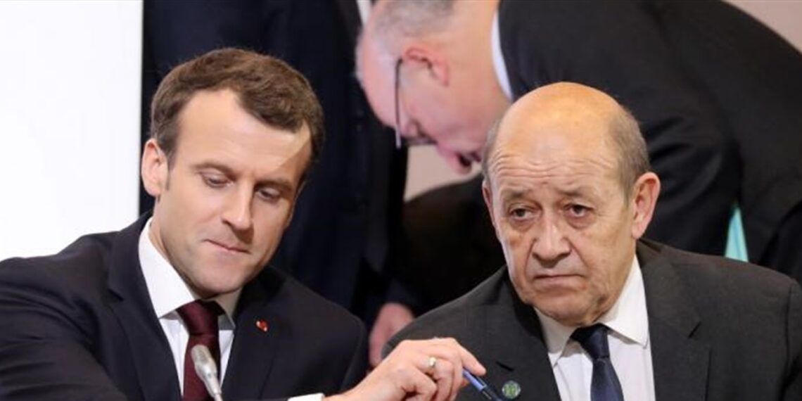 الرئيس القرنسي، إيمانويل ماكرون، ووزير خارجيته جان إيف لودريان.صورة.فرانس 24