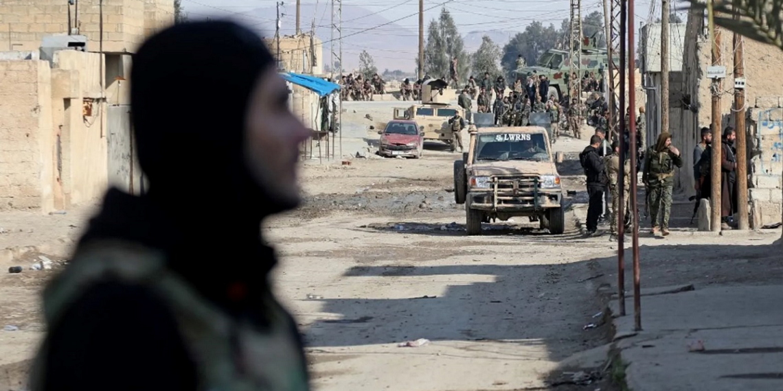 عناصر من تنظيم قسد في حي غويران.صورة.AFP