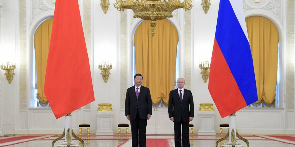 الرئيس الروسي فلاديمير بوتين، ونظيره الصيني شي جين بينغ.صورة.سبوتنيك