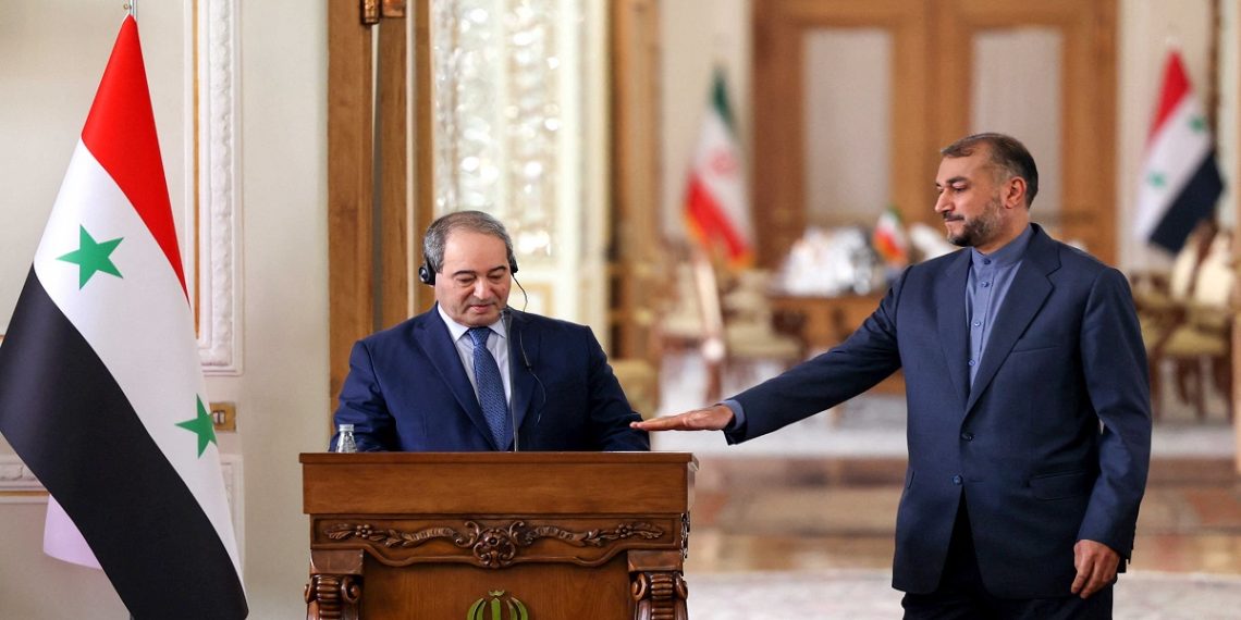 وزير الخارجية السوري، فيصل المقداد، ونظيره الإيراني، حسين أمير عبد اللهيان.صورة.AFP