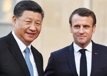 شي جين بينغ وإيمانويل ماكرون.صورة.تاس