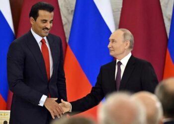 فلاديمير بوتين، وتميم بن حمد.صورة.AFP